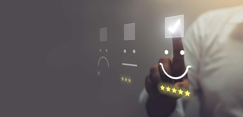 Businessman Pressing Smiley Face Emoticon On Virtual Touch Screen. Customer