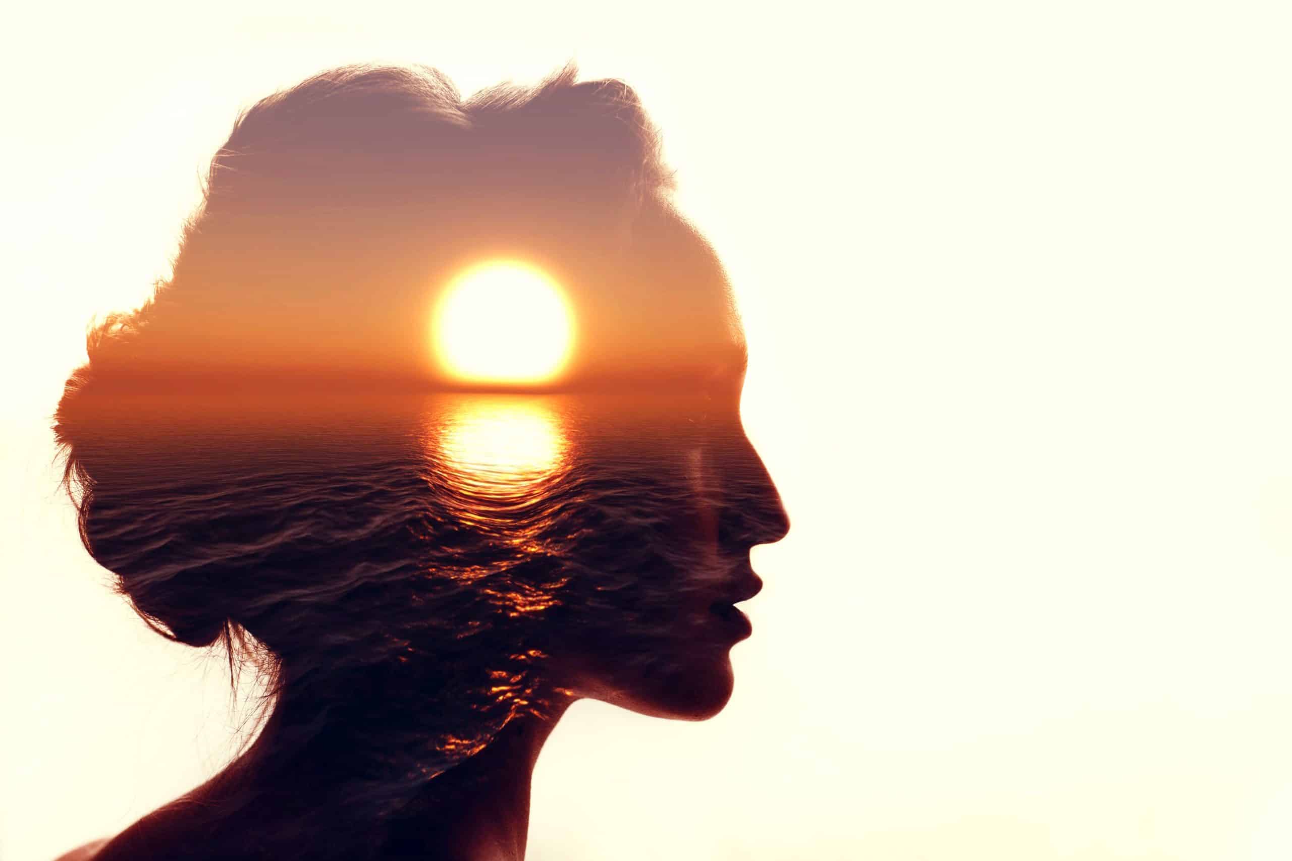 Sunrise And Woman Silhouette.